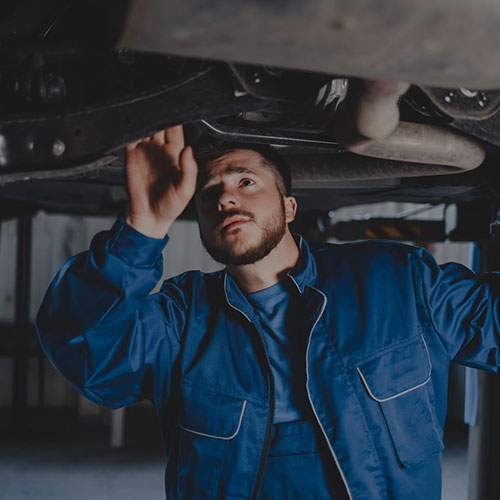 auto-mechanic-inspects-car